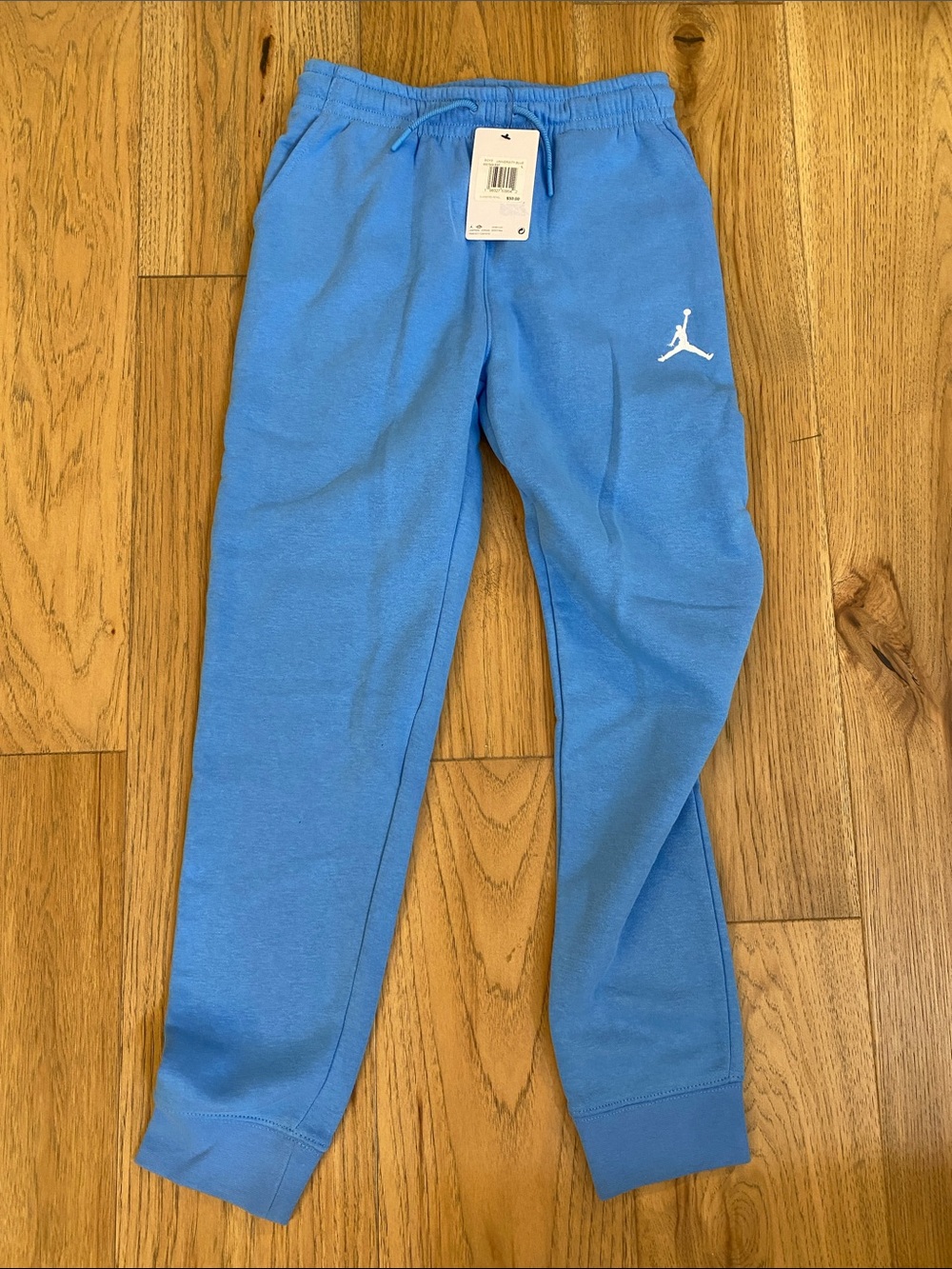Jordan Kids Light Blue Fleece Joggers with White Jumpman